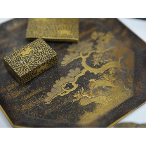 1445 - A group of Japanese lacquer wares; comprising a miniature kodansu in original box, signed to the top... 