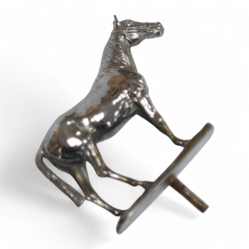 1449 - A silvered bronze horse car mascot, 12cm wide. Condition - good