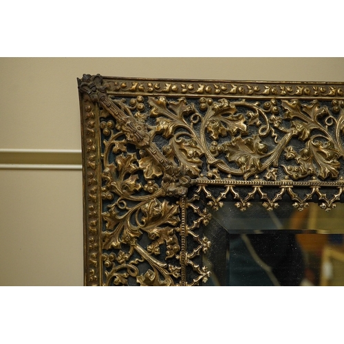 1450 - A period-style embossed metal easel mirror, 41cm x 50cm. Condition - easel stand missing now convert... 