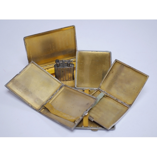 1852 - Three assorted George V silver and enamel cigarette cases, each decorated with a pennant, the larges... 