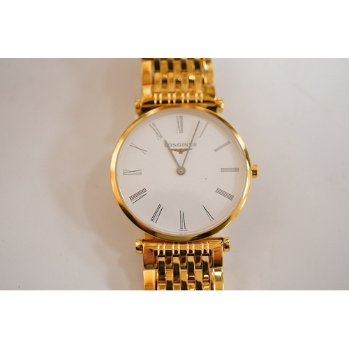 1900 - A lady's steel and gold plated Longines Le Grande Classique quartz wrist watch, white dial, case dia... 