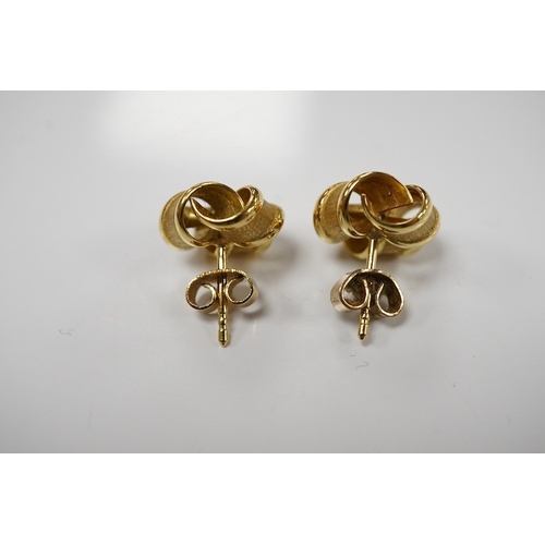 1902 - A pair of 18ct yellow gold stud earrings of knotted design with a textured finish, 1.1cm diameter ea... 