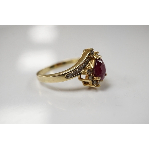 1912 - A recent 14k, ruby and diamond cluster set dress ring, size O,  gross weight 3.4 grams. Condition - ... 