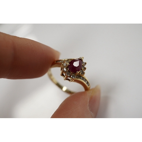 1912 - A recent 14k, ruby and diamond cluster set dress ring, size O,  gross weight 3.4 grams. Condition - ... 