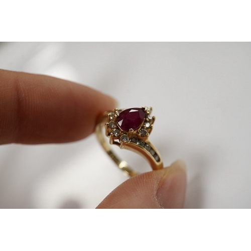 1912 - A recent 14k, ruby and diamond cluster set dress ring, size O,  gross weight 3.4 grams. Condition - ... 