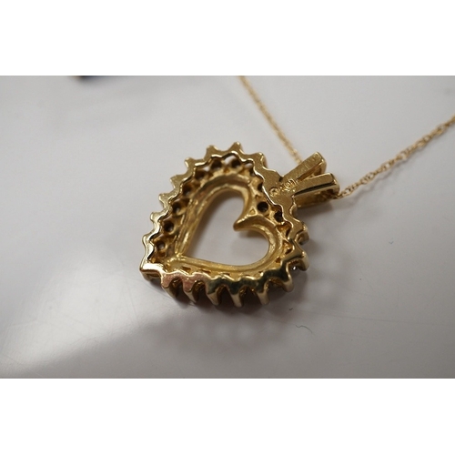 1914 - A modern 10K fine link chain, 46cm, together with a 10k and diamond set open heart shaped pendant, 2... 