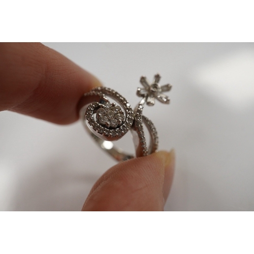 1919 - A modern 18ct white gold and diamond cluster set split shank double flower head ring, size K, gross ... 