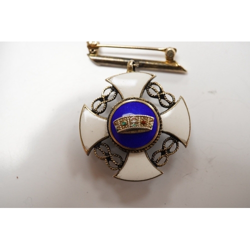 1926 - A North American yellow metal and two colour enamelled medallion, 23mm, with suspension brooch, broo... 