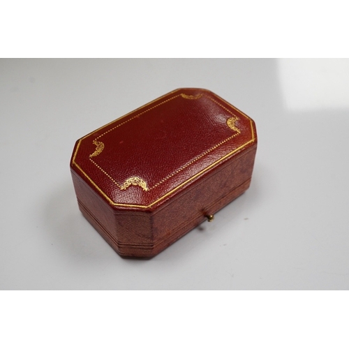 1929 - A 1930's/1940's Cartier gilt tooled leather cufflink box, of octagonal form, 83mm by 54mm. Condition... 