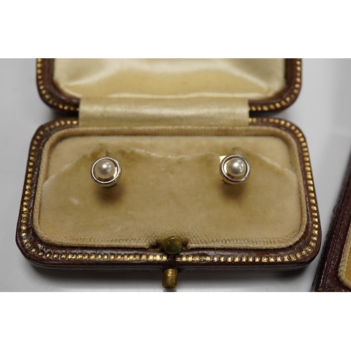 1933 - A group of gentleman's accessories, early 20th century, comprising: two pairs of cultured pearl coll... 