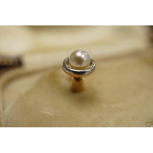 1933 - A group of gentleman's accessories, early 20th century, comprising: two pairs of cultured pearl coll... 