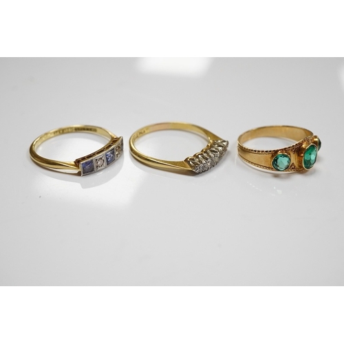 1935 - A group of three rings and a gold toothpick comprising: a five-stone French-cut synthetic sapphire a... 