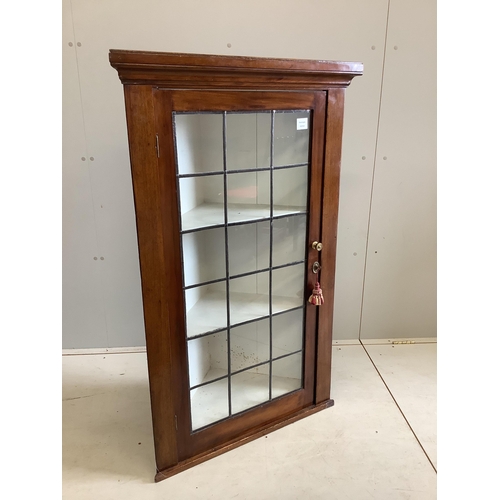 100 - A George III style glazed mahogany hanging corner cabinet, with leaded glazing bars, width 77cm, dep... 