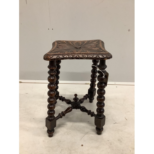 104 - A Victorian carved oak bobbin turned stool, bears Bruce & Co. trade label, height 46cm. Condition - ... 