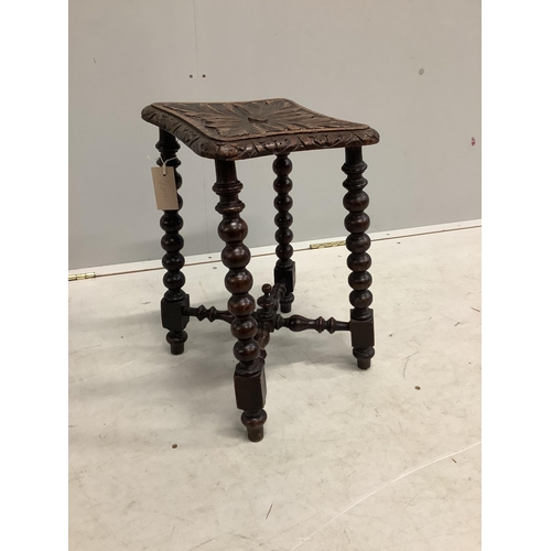 104 - A Victorian carved oak bobbin turned stool, bears Bruce & Co. trade label, height 46cm. Condition - ... 