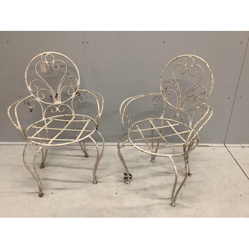 14 - A pair of vintage wrought iron garden chairs, width 53cm, depth 46cm, height 85cm. Condition - poor ... 