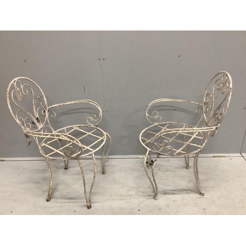 14 - A pair of vintage wrought iron garden chairs, width 53cm, depth 46cm, height 85cm. Condition - poor ... 