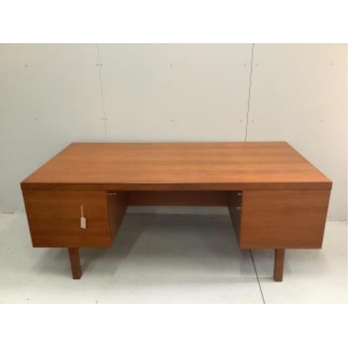 23 - Alfred Cox, a mid century teak kneehole desk, width 183cm, depth 92cm, height 71cm. Condition - good... 