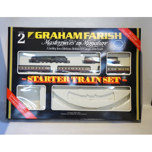 252 - Four boxed Graham Farish N gauge railway train sets; a Diesel Freight set, comprising a Class 25 die... 