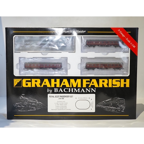 255 - Four boxed Graham Farish N gauge railway train sets; a Royal Mail set, comprising a Class 47 diesel ... 