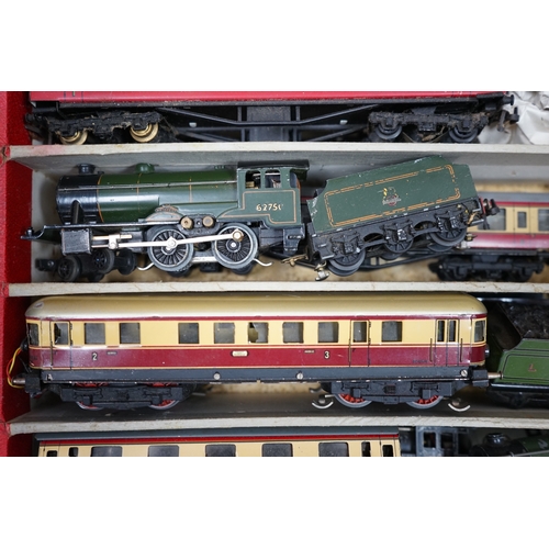 287 - A Trix Twin Railway 00 gauge train set box containing; four locomotives, eight bogie coaches, two ra... 