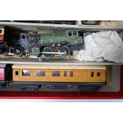 287 - A Trix Twin Railway 00 gauge train set box containing; four locomotives, eight bogie coaches, two ra... 