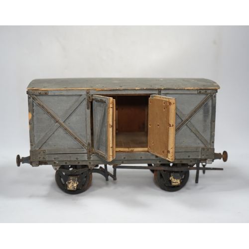 295 - A 1950s/60s 3.5 inch gauge model railway box van, scratch built of plywood construction, with openin... 