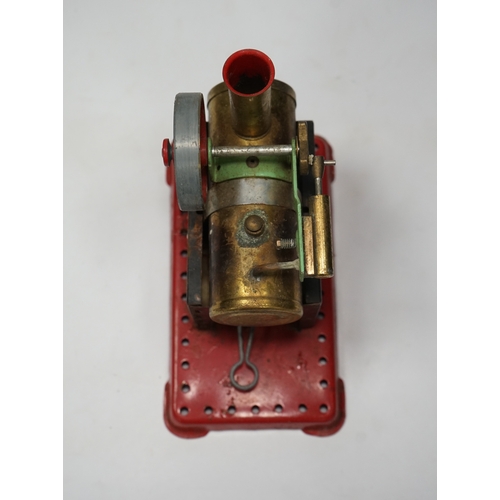 296 - A Mamod live steam traction engine and a single cylinder stationary engine. Condition - poor to fair... 