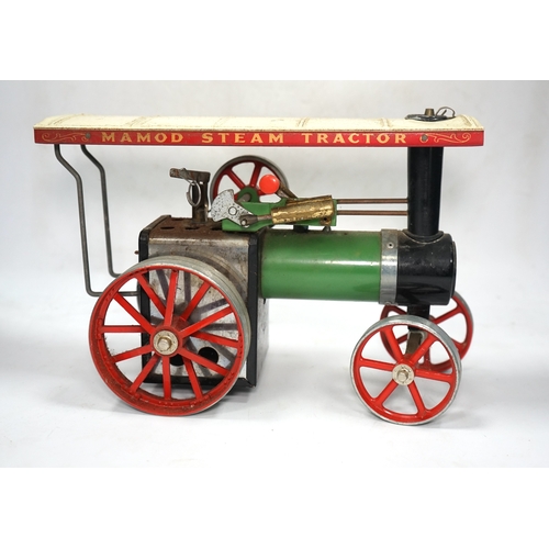 296 - A Mamod live steam traction engine and a single cylinder stationary engine. Condition - poor to fair... 