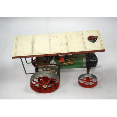 296 - A Mamod live steam traction engine and a single cylinder stationary engine. Condition - poor to fair... 