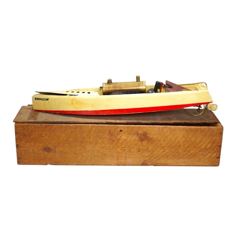 297 - A 1930s wooden boxed Bowman Models live steam speedboat; Swallow, of wood and tinplate constructio... 