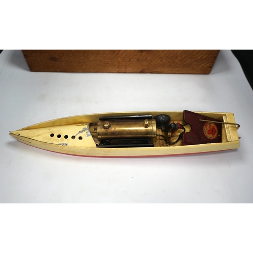 297 - A 1930s wooden boxed Bowman Models live steam speedboat; Swallow, of wood and tinplate constructio... 