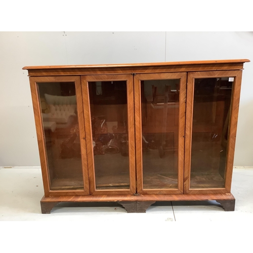 3 - A large 19th century glazed kingwood bookcase, fitted four hinged doors and three adjustable shelves... 