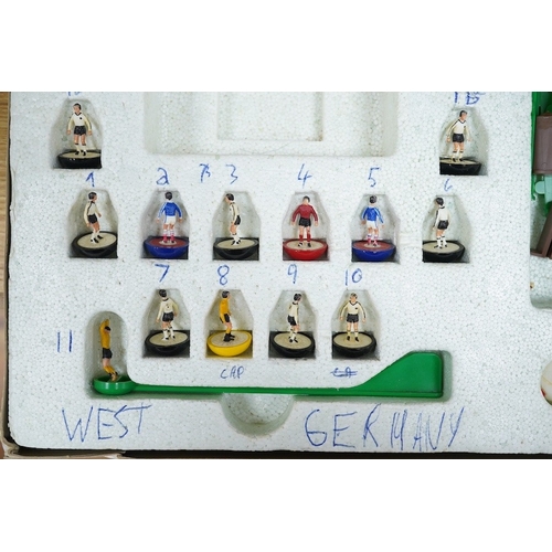 303 - Two boxed Subbuteo table football sets; a European Edition, comprising of two teams, spectators and ... 