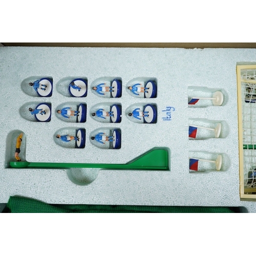 303 - Two boxed Subbuteo table football sets; a European Edition, comprising of two teams, spectators and ... 