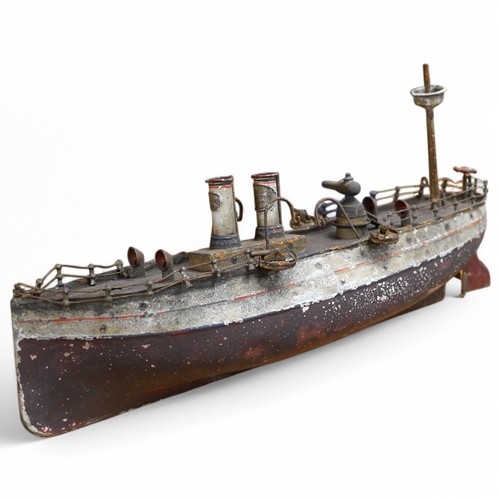 309 - An Ernst Plank for Gamages Ltd clockwork tinplate gun-boat, 40cm in length. Condition - poor.