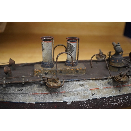 309 - An Ernst Plank for Gamages Ltd clockwork tinplate gun-boat, 40cm in length. Condition - poor.