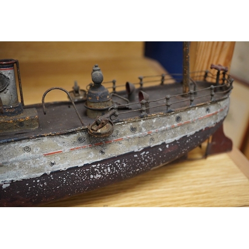 309 - An Ernst Plank for Gamages Ltd clockwork tinplate gun-boat, 40cm in length. Condition - poor.