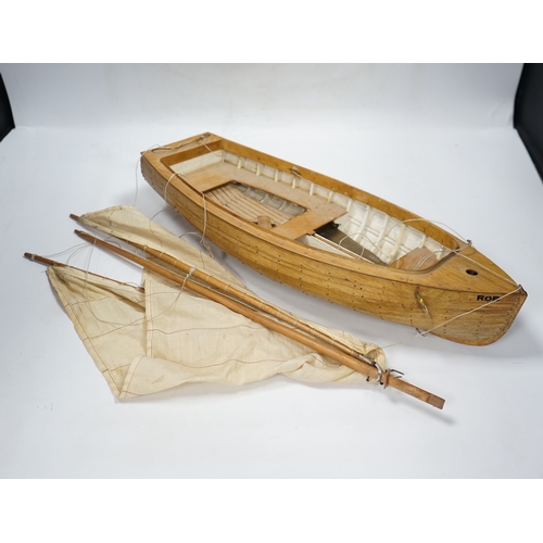 310 - A mid 20th century kit built wooden model sailing boat, Rob, of plank on frame construction with w... 