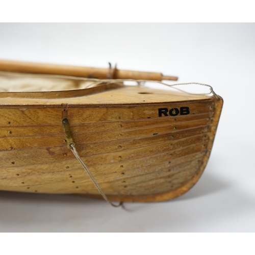 310 - A mid 20th century kit built wooden model sailing boat, Rob, of plank on frame construction with w... 