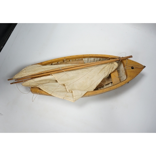 310 - A mid 20th century kit built wooden model sailing boat, Rob, of plank on frame construction with w... 