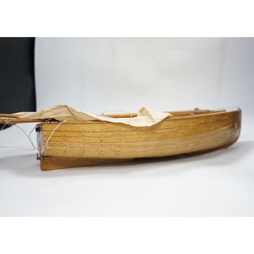 310 - A mid 20th century kit built wooden model sailing boat, Rob, of plank on frame construction with w... 