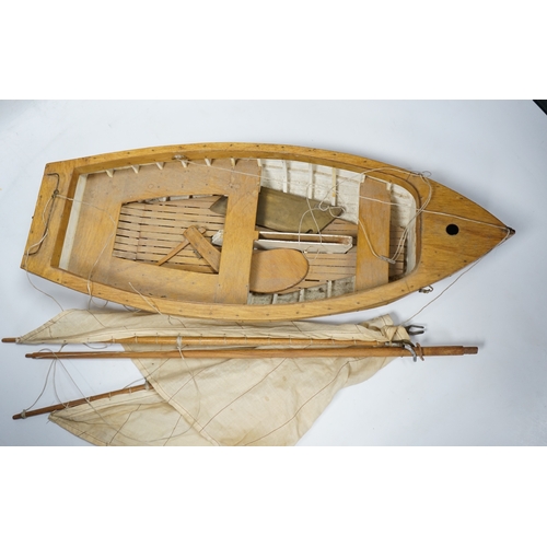 310 - A mid 20th century kit built wooden model sailing boat, Rob, of plank on frame construction with w... 