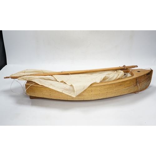 310 - A mid 20th century kit built wooden model sailing boat, Rob, of plank on frame construction with w... 