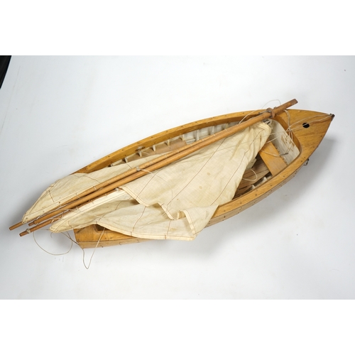 310 - A mid 20th century kit built wooden model sailing boat, Rob, of plank on frame construction with w... 