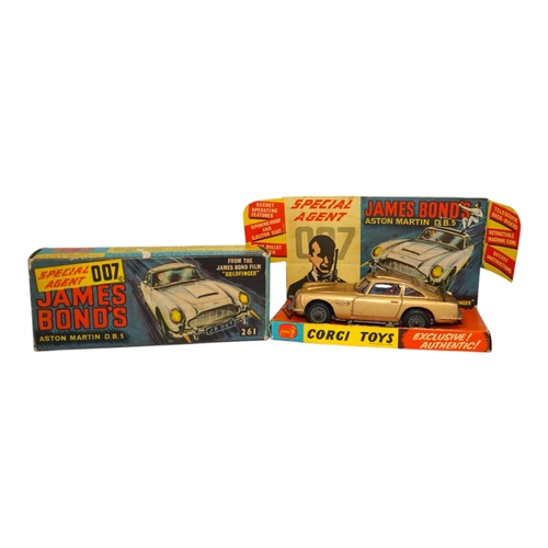 317 - A boxed Corgi Toys James Bond 007 Aston Martin DB5 (261), a gold Aston Martin, with inner display st... 