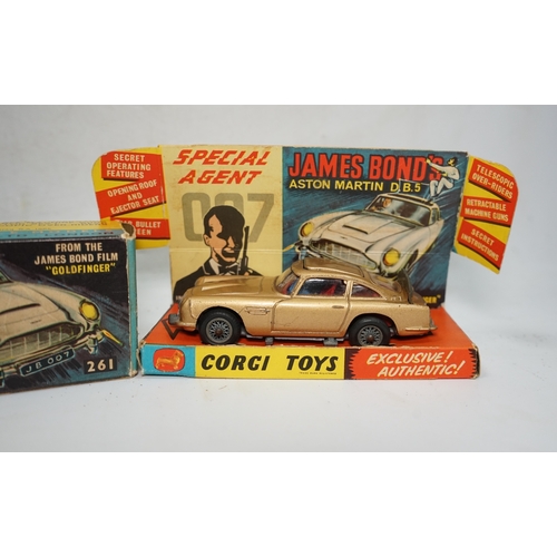 317 - A boxed Corgi Toys James Bond 007 Aston Martin DB5 (261), a gold Aston Martin, with inner display st... 