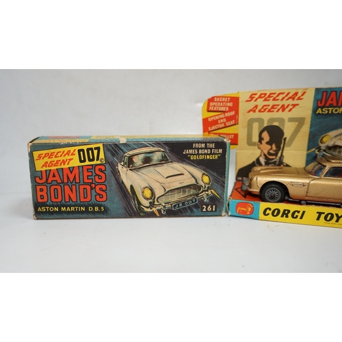 317 - A boxed Corgi Toys James Bond 007 Aston Martin DB5 (261), a gold Aston Martin, with inner display st... 