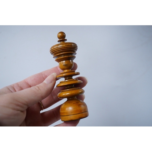 319 - A turned wooden chess set in ebony and boxwood, king 10.5cm high, in a hardwood box. Condition - goo... 