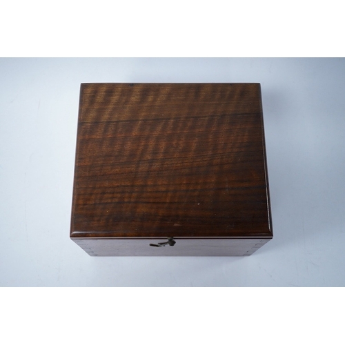 319 - A turned wooden chess set in ebony and boxwood, king 10.5cm high, in a hardwood box. Condition - goo... 